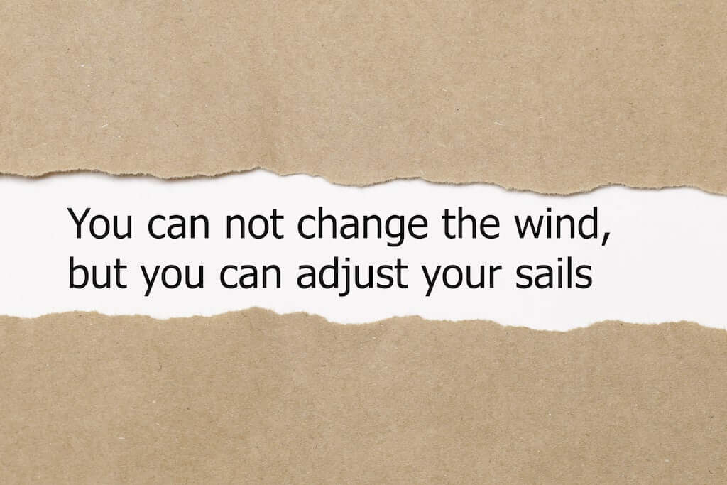 Text that reads, "You can not change the wind, but you can change your sails.