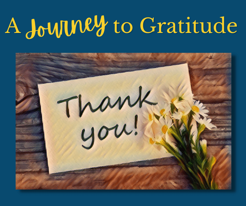 A Journey to Gratitude with Thank You written on a note and flowers on the table