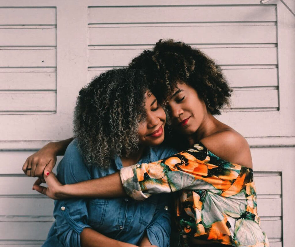 Mother and daughter hugging